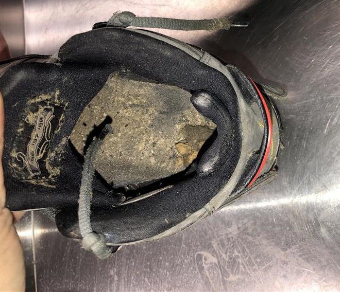 Shoe affected by fire damage